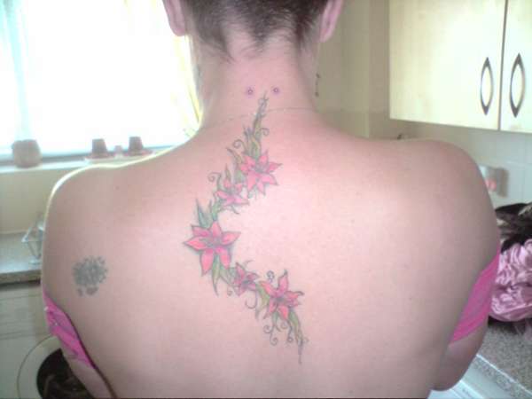unfinished flowers tattoo