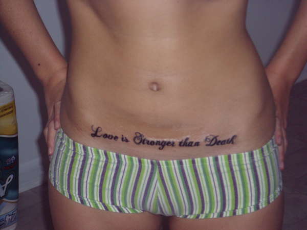 "Love is stronger is death" tattoo