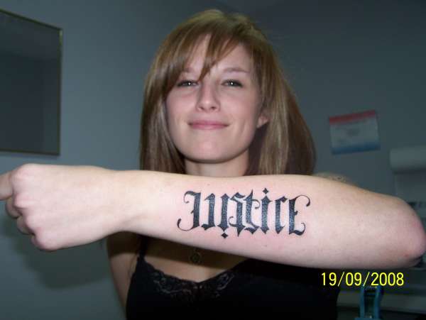 ambigram tattoo"JUSTICE" tattoo