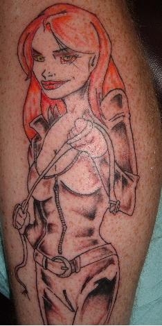Chick in leather tattoo