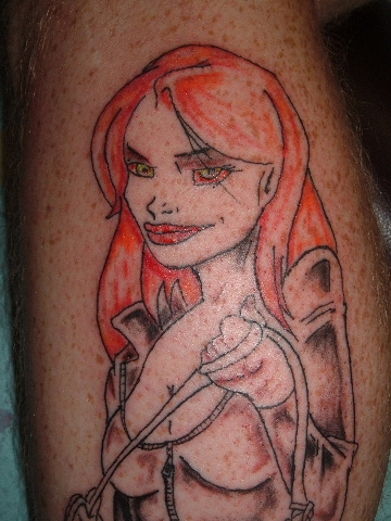 chick in leather face closeup tattoo