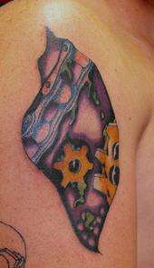 bio-mechanic shoulder tattoo