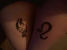 fire symbol/leo label tattoo