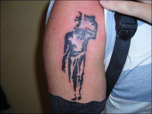 suicide man tattoo