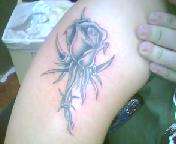 Rose with Barbed wire tattoo