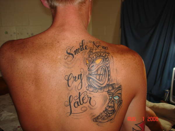 smile now cry later tattoo back