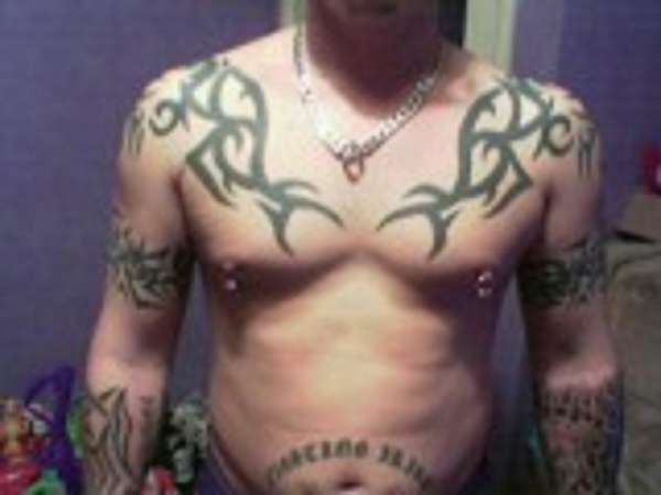 tribal chest tattoo