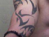 Lower arm tribal tattoo