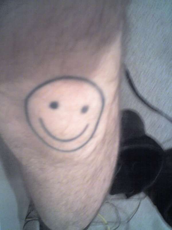 Smiley Face tattoo