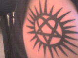Joel Heartagram tattoo