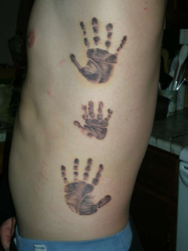 handprints tattoo