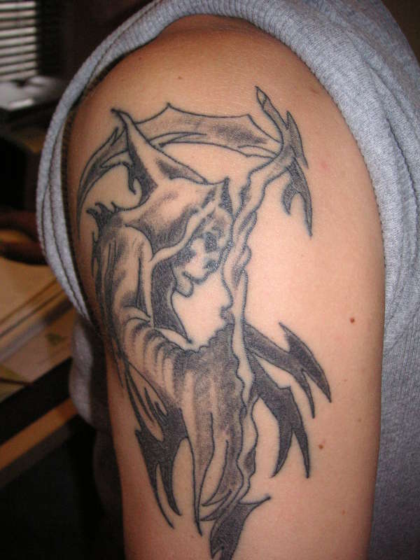 my 1st Tattoo.. The Reaper tattoo