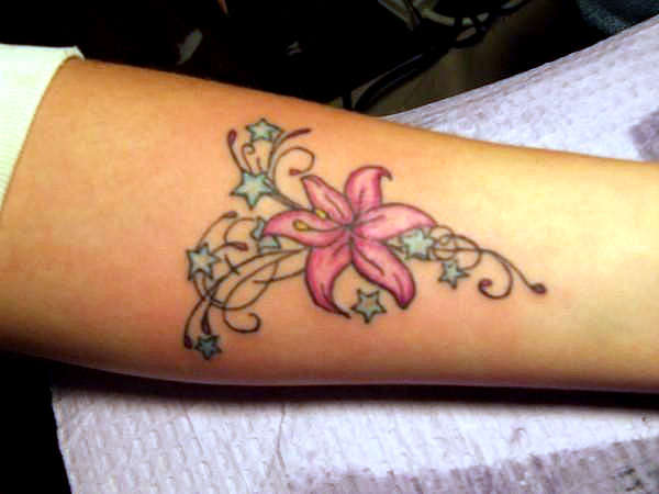 nice flower on wrist tattoo