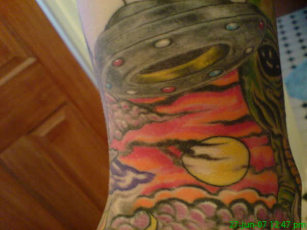 slying saucer tattoo