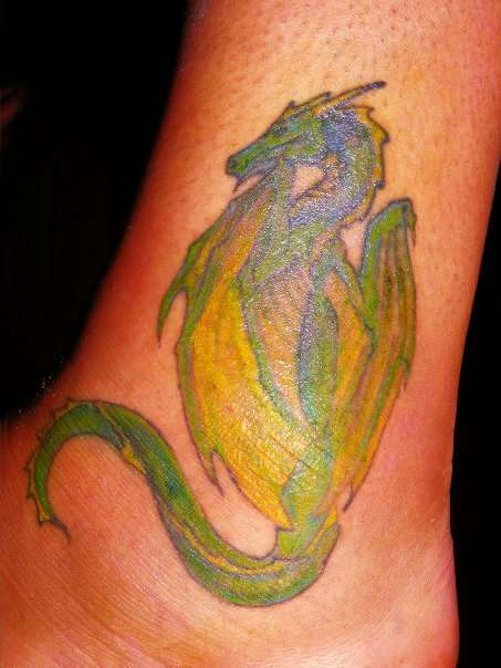 Sitting Dragon tattoo