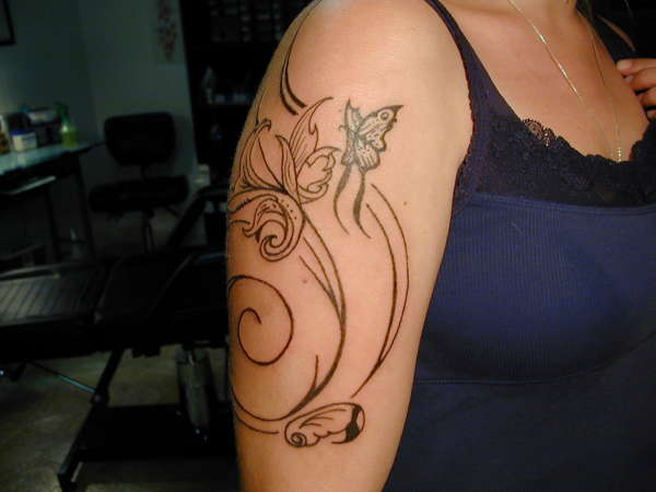 Hillary's Swoop tattoo