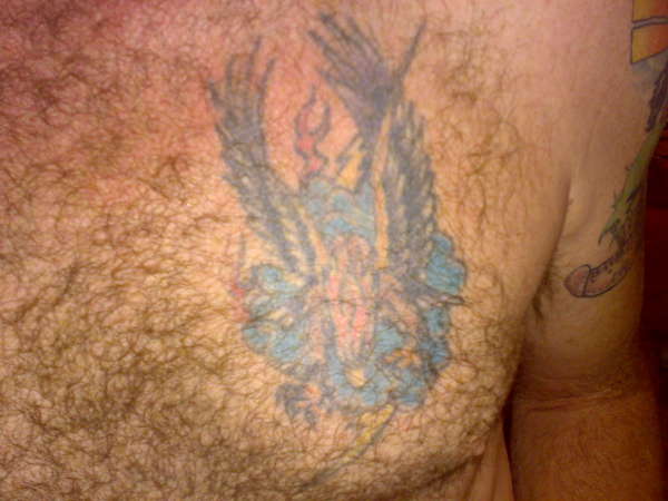 Hairy chest eagle tattoo