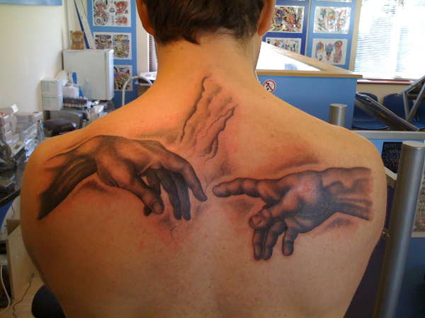 Michelangelo's hands tattoo