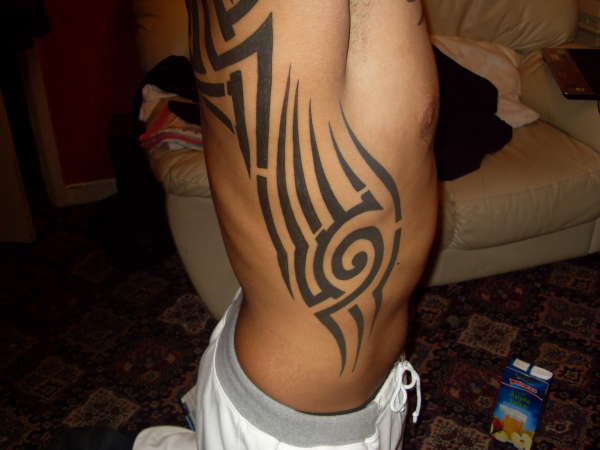 Tribal Rib tattoo