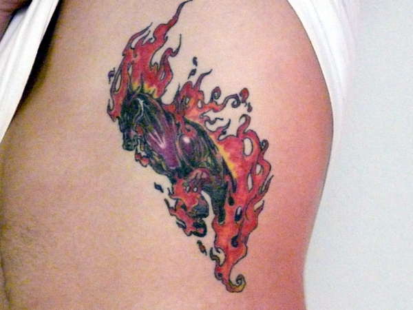 horse coming out of flames tattoo