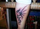 DUAGHTERS NAME AS DRAGON tattoo