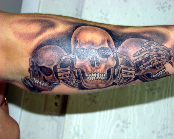 Hear, see, speak no evil skulls tattoo