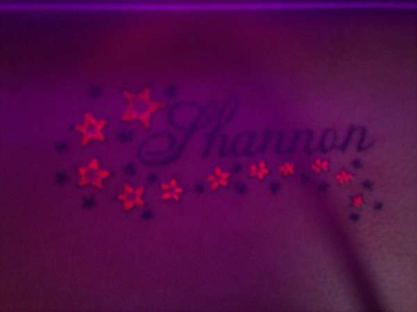 Uv stars with name tattoo