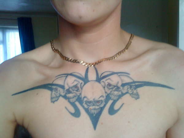 chest tat tattoo
