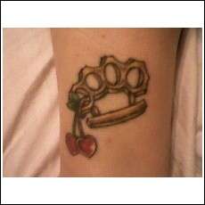 Brass Knuckles tattoo