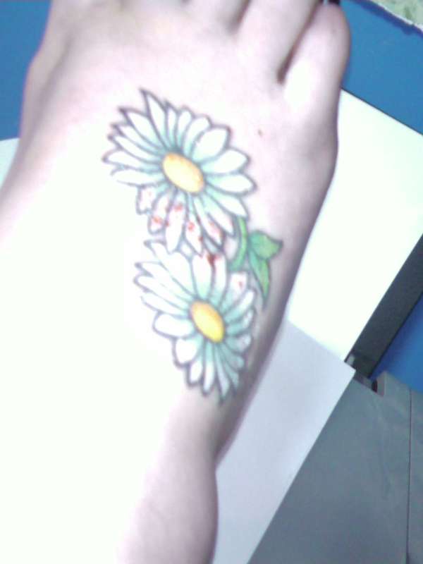 Daisies tattoo
