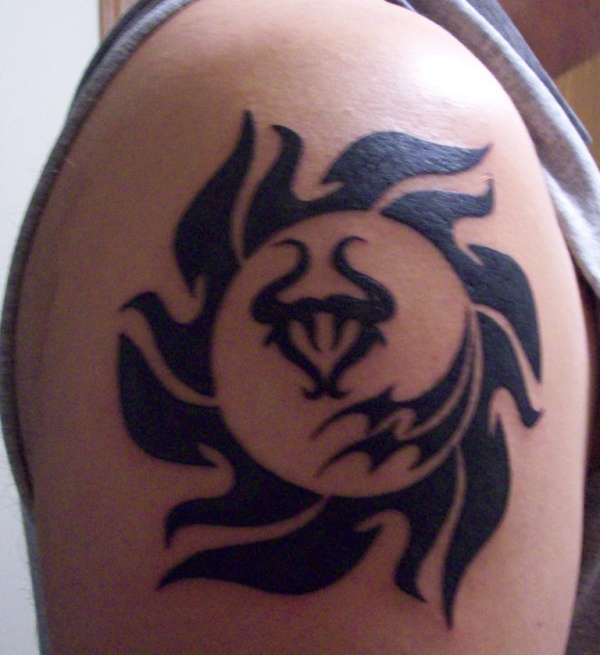 Tribal sun tattoo