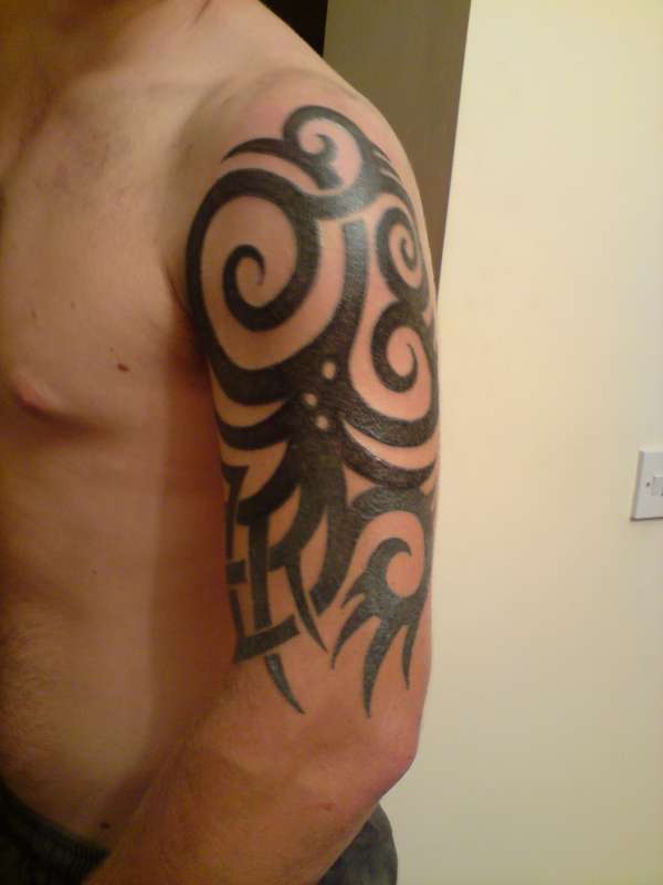 TRIBAL COVER UP WORK tattoo