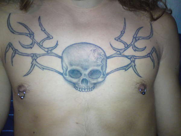 Decadence chestpiece tattoo