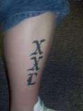 XXL Tat tattoo