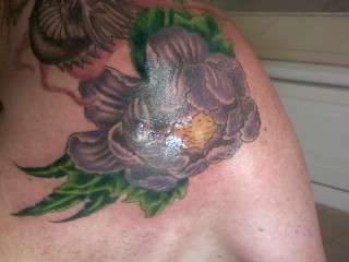 colored flower tattoo