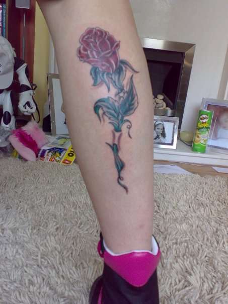 Rose for a love lost tattoo