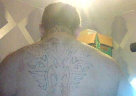 tribal back piece tattoo