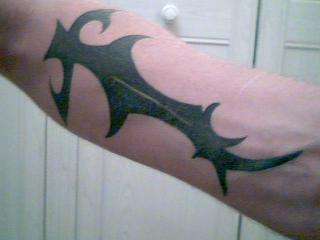 Tribal Dagger tattoo
