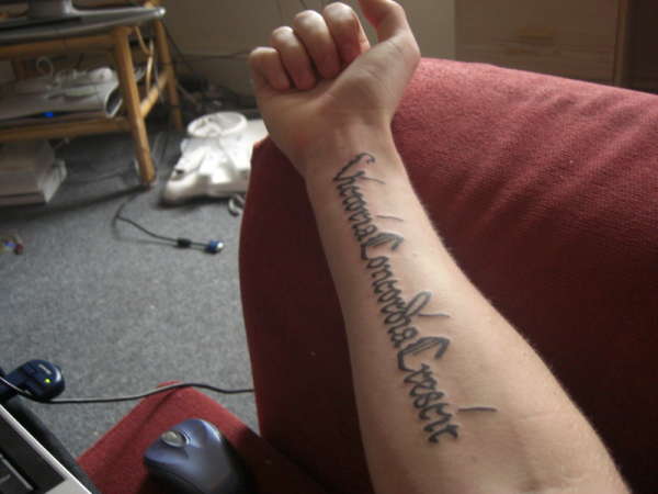 Victory Through Harmony tattoo