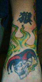 Jester and Flames tattoo