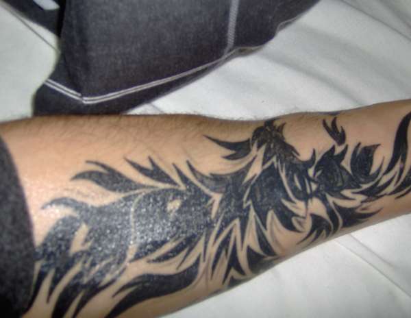 Tribal Phoenix tattoo