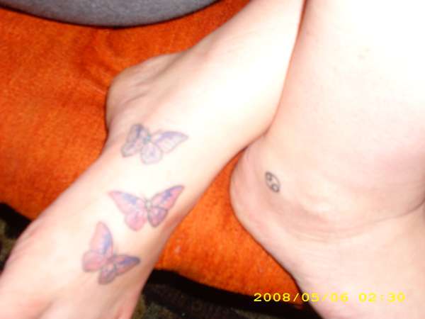 butterfiles and zodiac sign tattoo