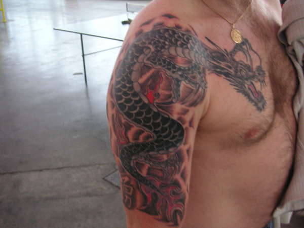 Dragon with Kanji (courage) tattoo