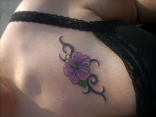 Flower with Tribal tattoo