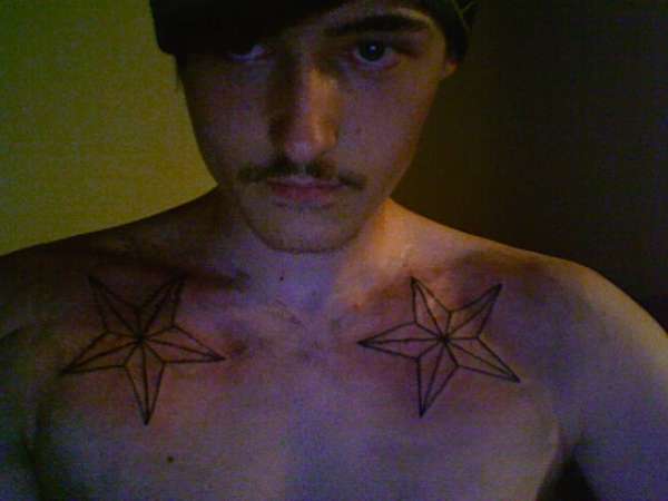 Star outline tattoo