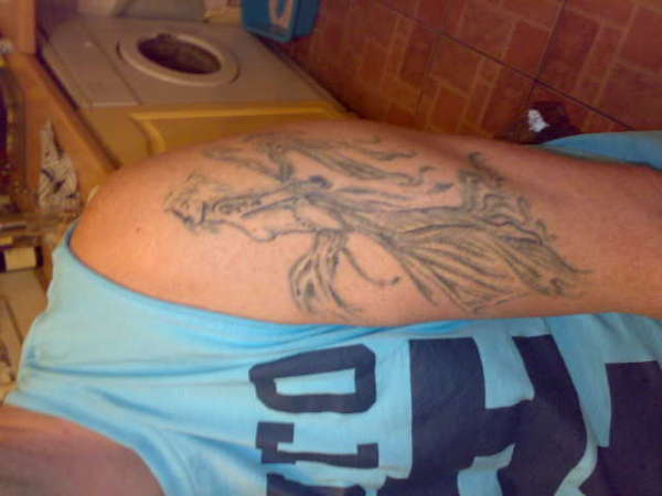 left arm tattoo