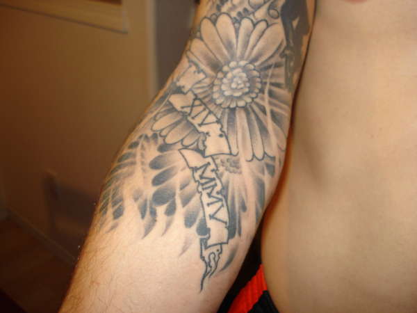 Daisy in my sleeve tattoo