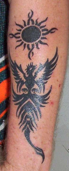 phoenix / face tattoo