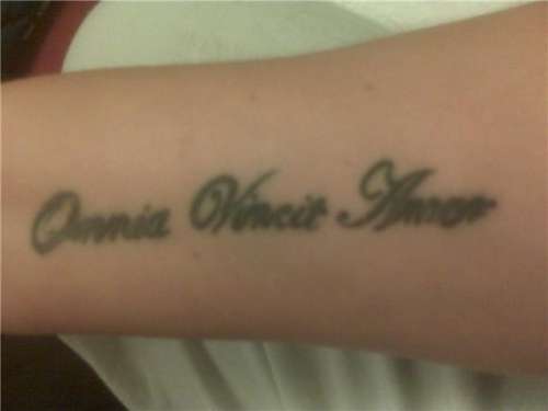 omnia vincit amor tattoo