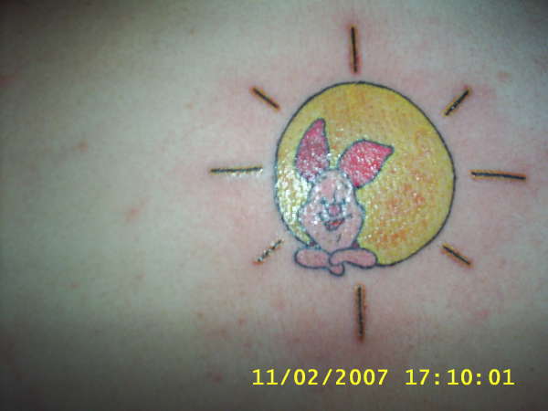 piglet hangin in the sun tattoo